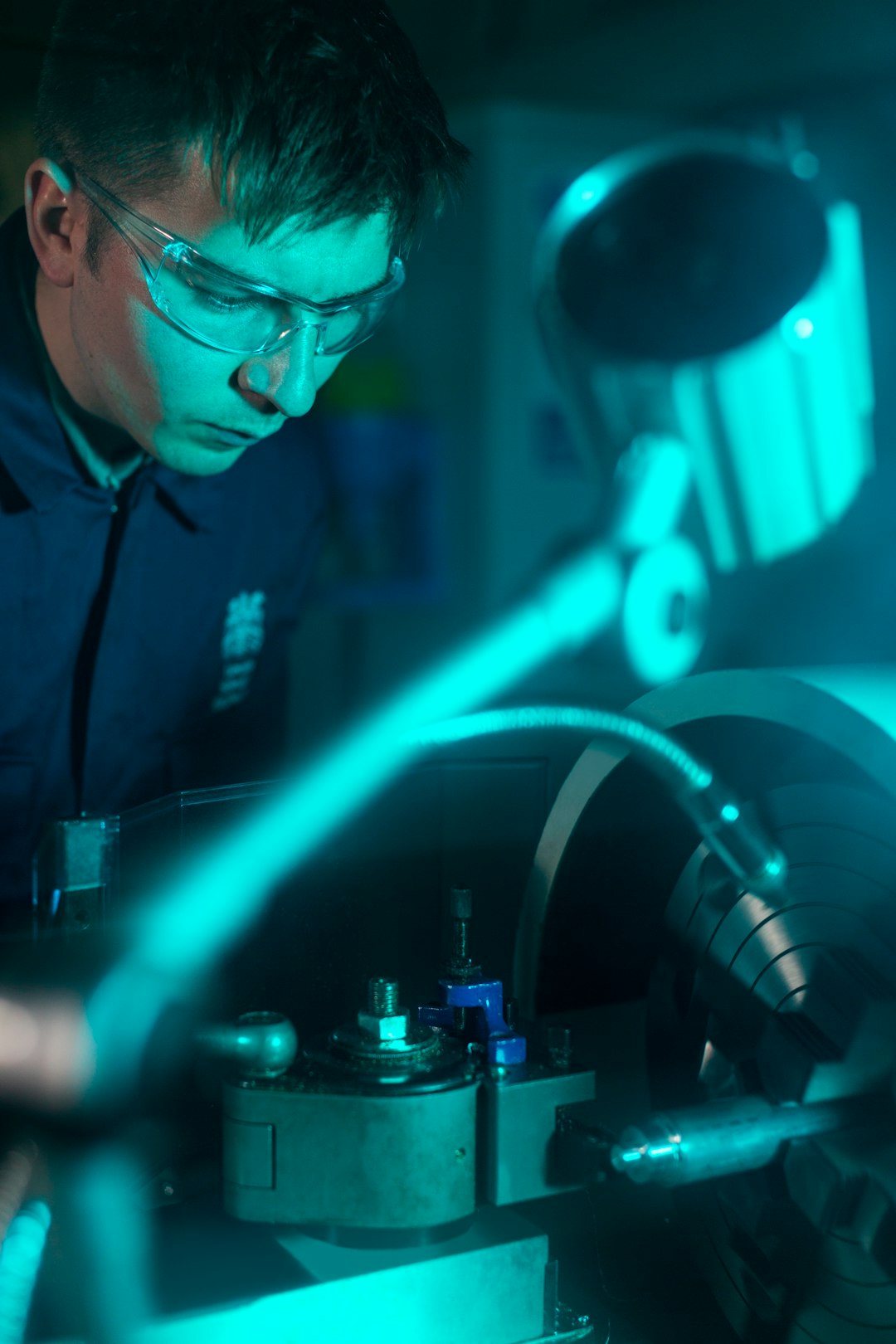 Engineer working on industrial machinery